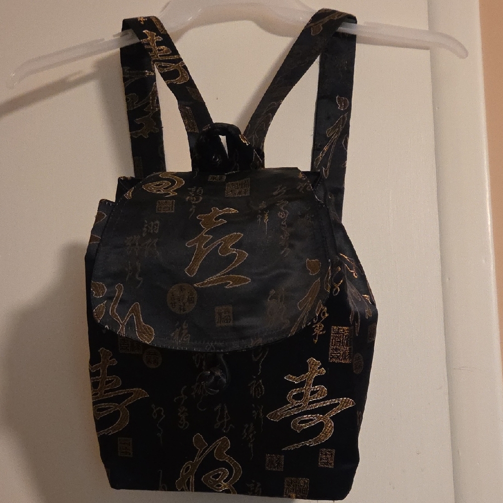 Black and Gold Patterned Backpack